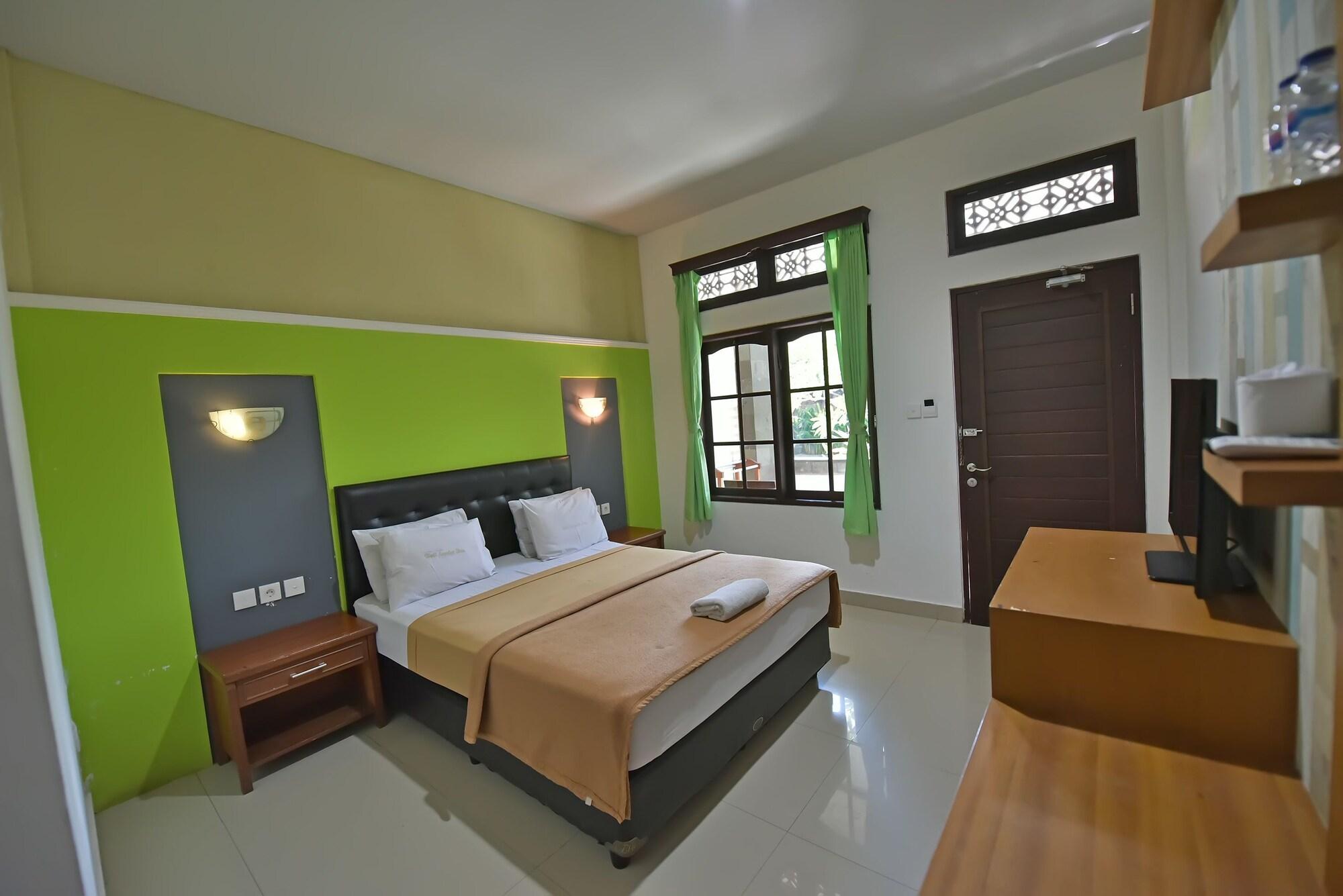 Sandat Hotel Kuta Кута Екстериор снимка