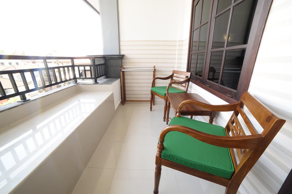 Sandat Hotel Kuta Кута Стая снимка