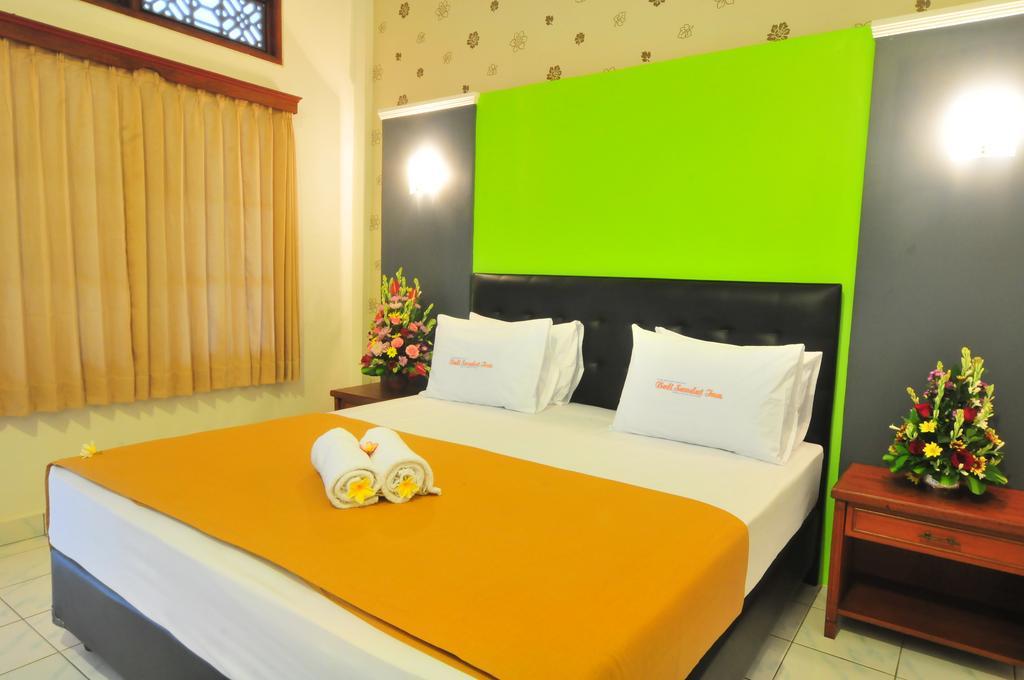 Sandat Hotel Kuta Кута Стая снимка