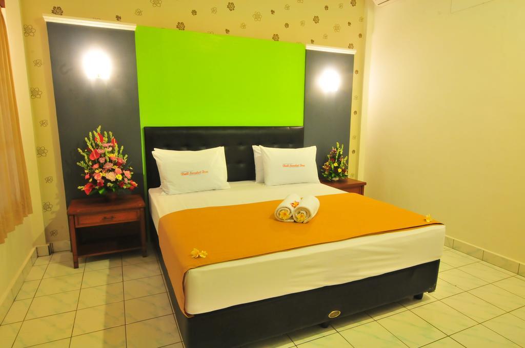 Sandat Hotel Kuta Кута Стая снимка